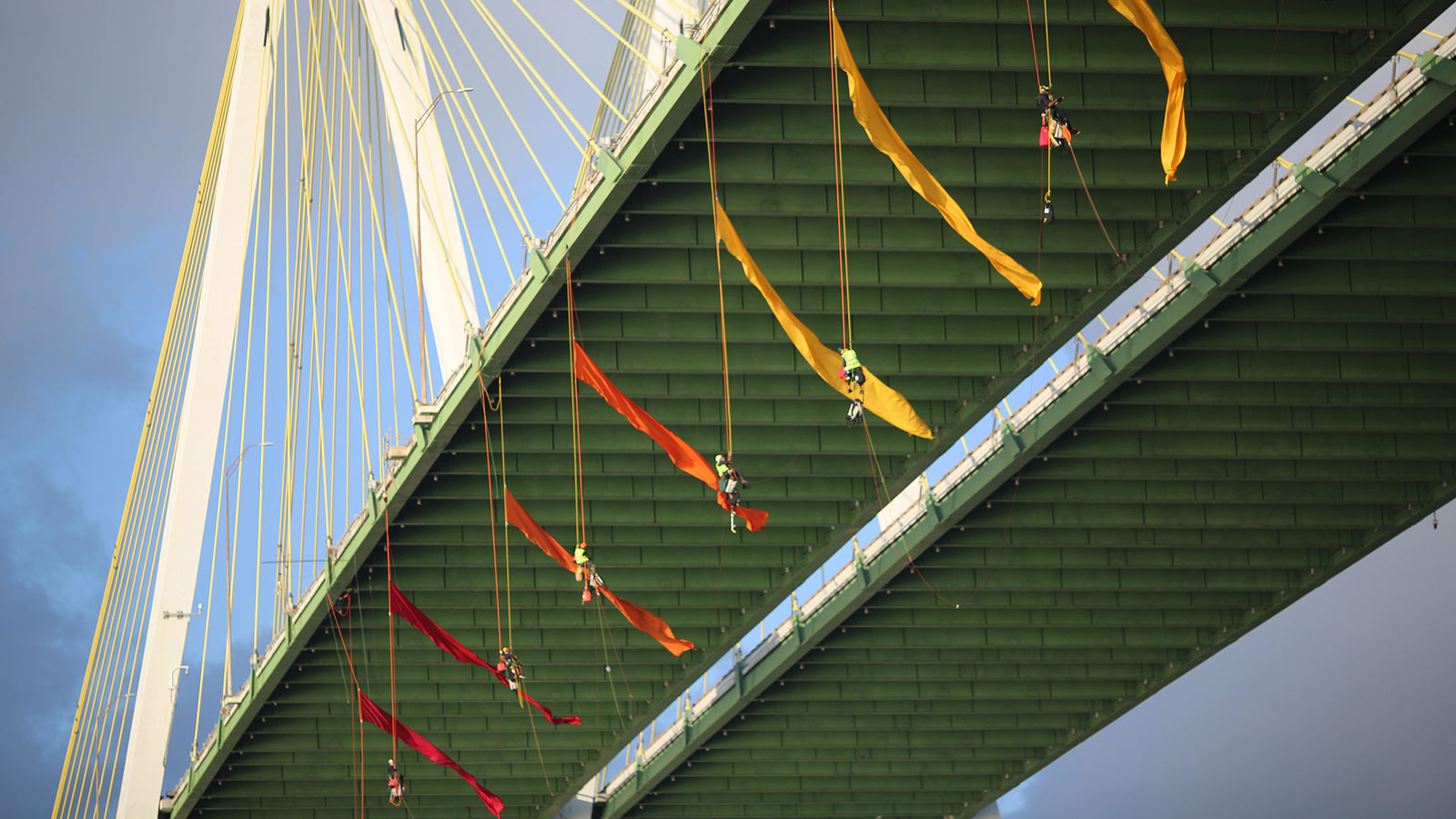 Greenpeace USA climbers form a blockade on the Fred Hartman Bridge in Baytown, Texas