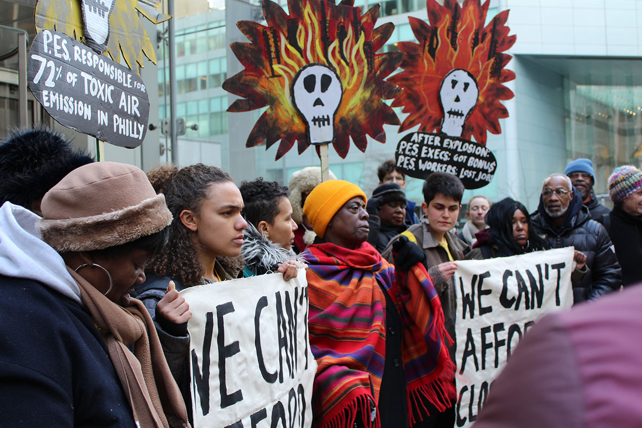 Climate activists gather in the streets of New York City to protest the closed-door auction to sell PES land.