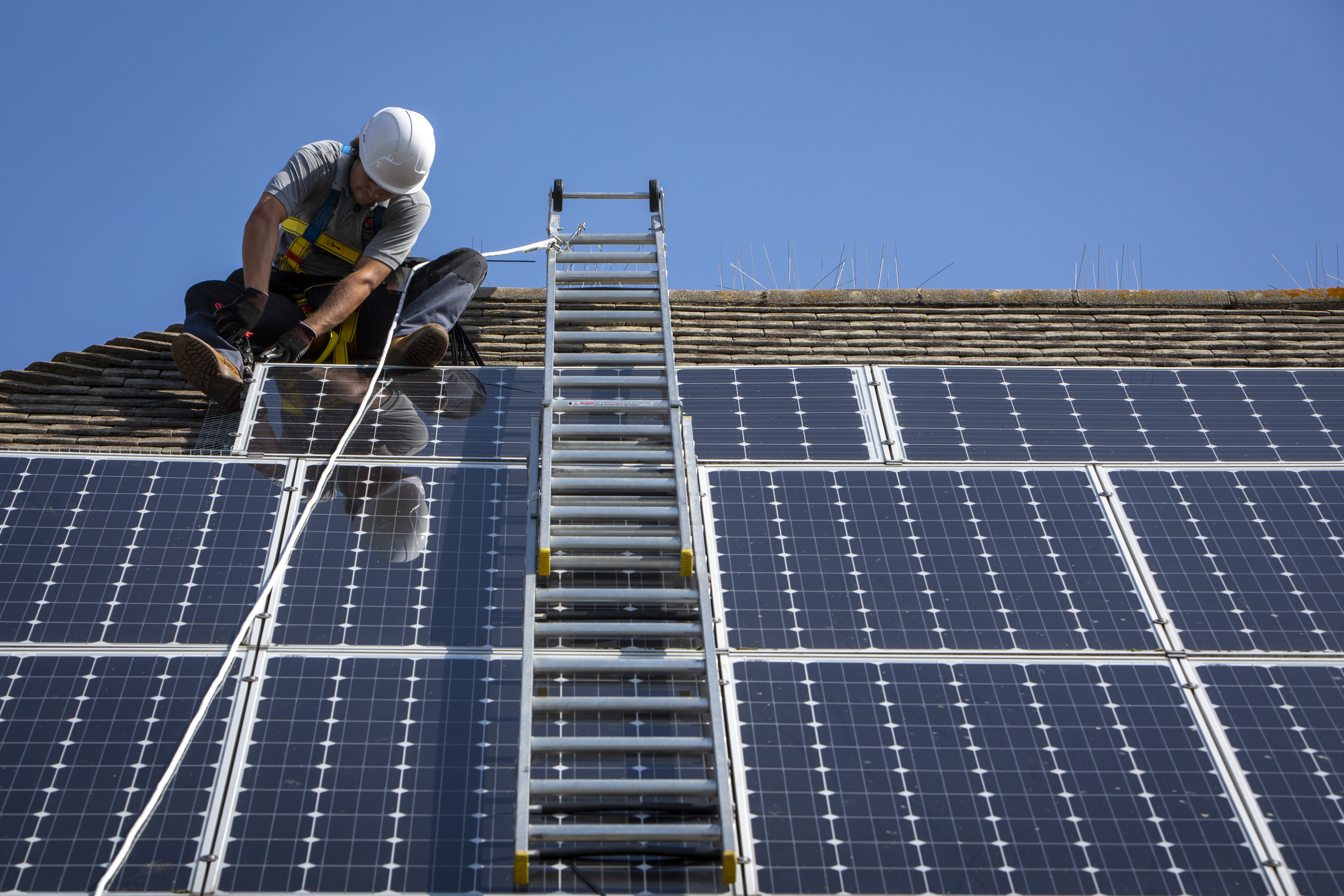 Rooftop solar worker