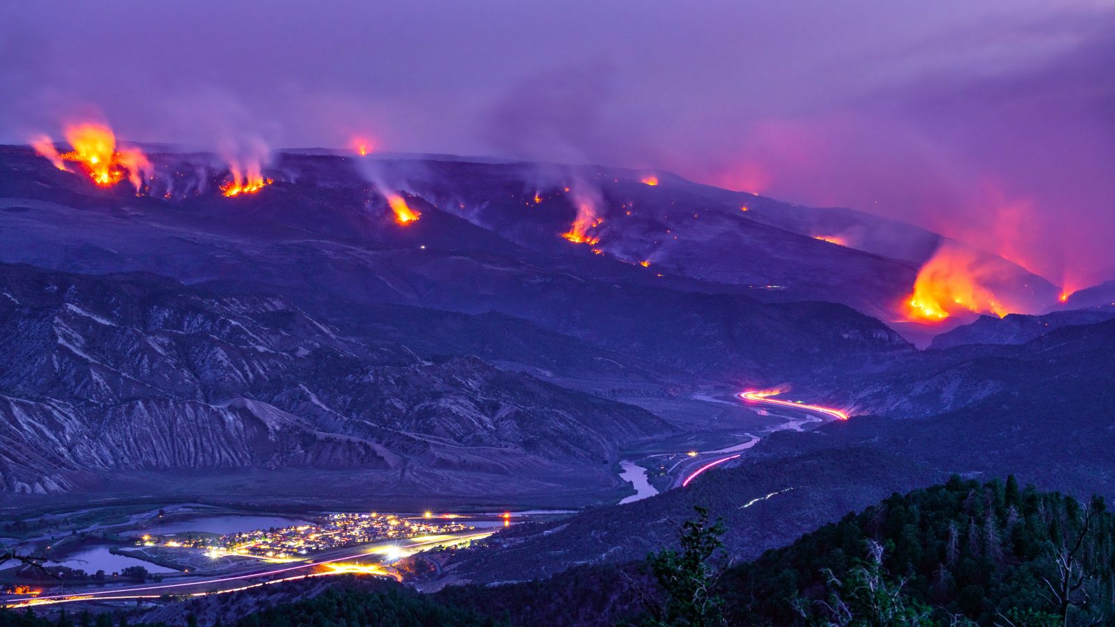 Glowing fire from Grizzly Creek Glenwood Canyon fire, Summer 2020. Dotsero, Colorado USA.