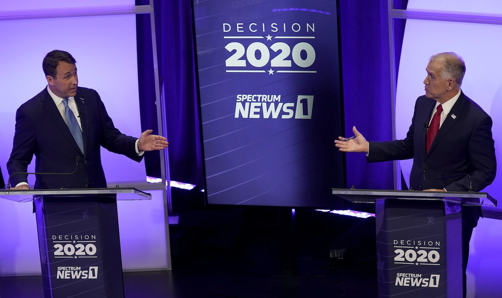 Democratic challenger Cal Cunningham, left, and U.S. Sen. Thom Tillis, R-N.C. talk during a televised debate Thursday, Oct. 1, 2020 in Raleigh, N.C. 