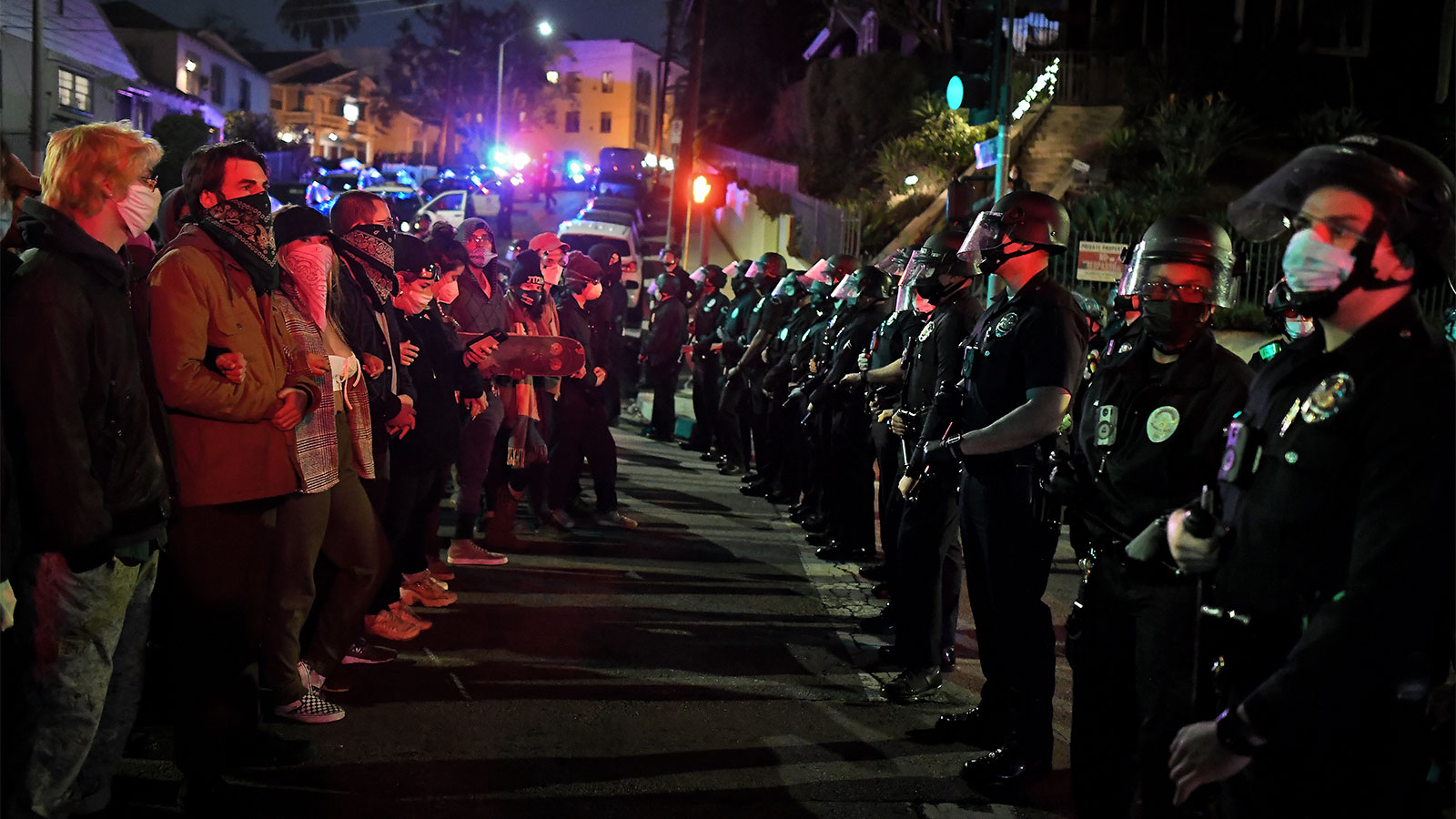 LAPD officers and protestors square-off at Santa Ynez St. and Glendale Ave. in Echo Park