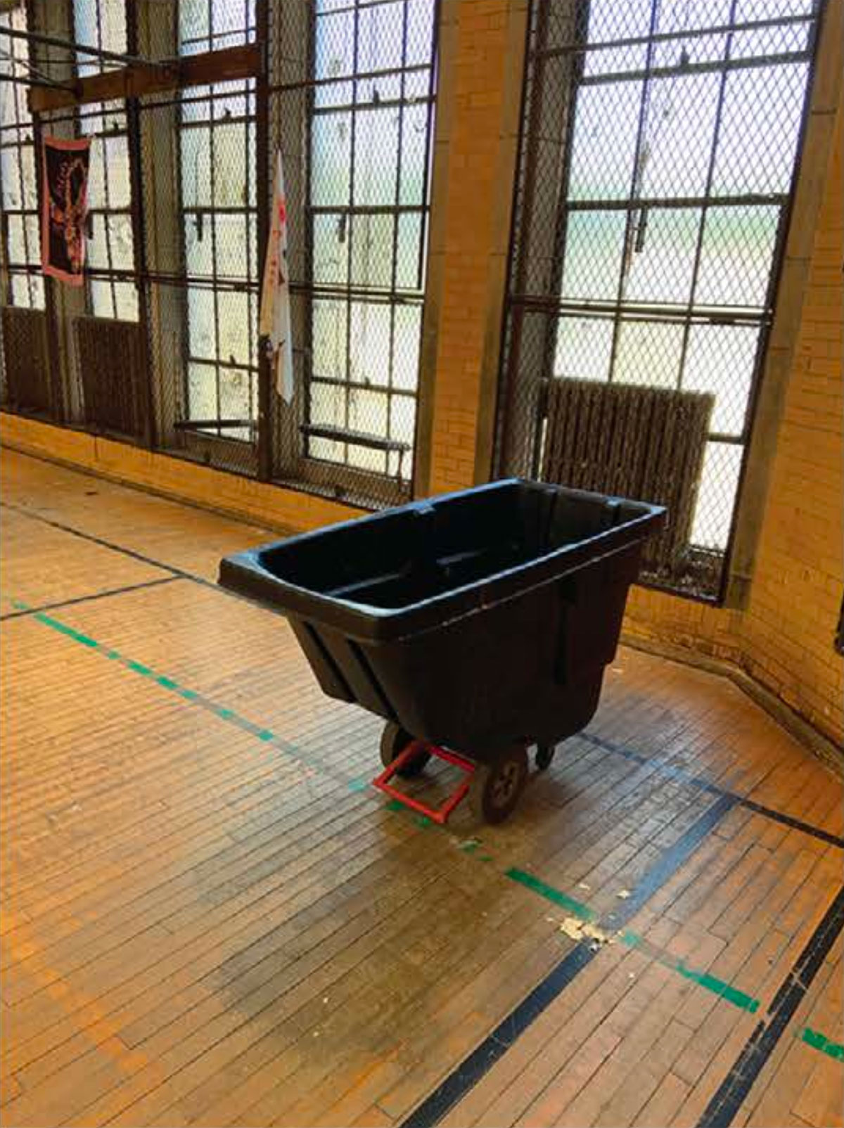 A rolling bin used to catch leaking water