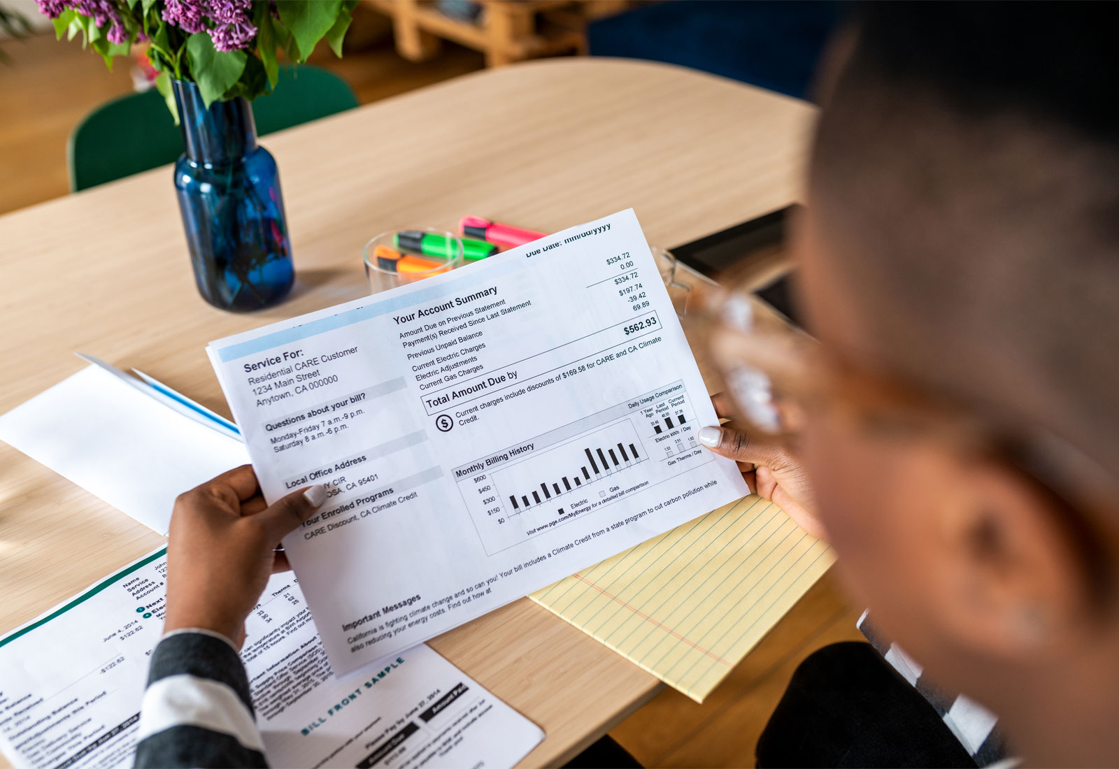 Man looking at his electric bill