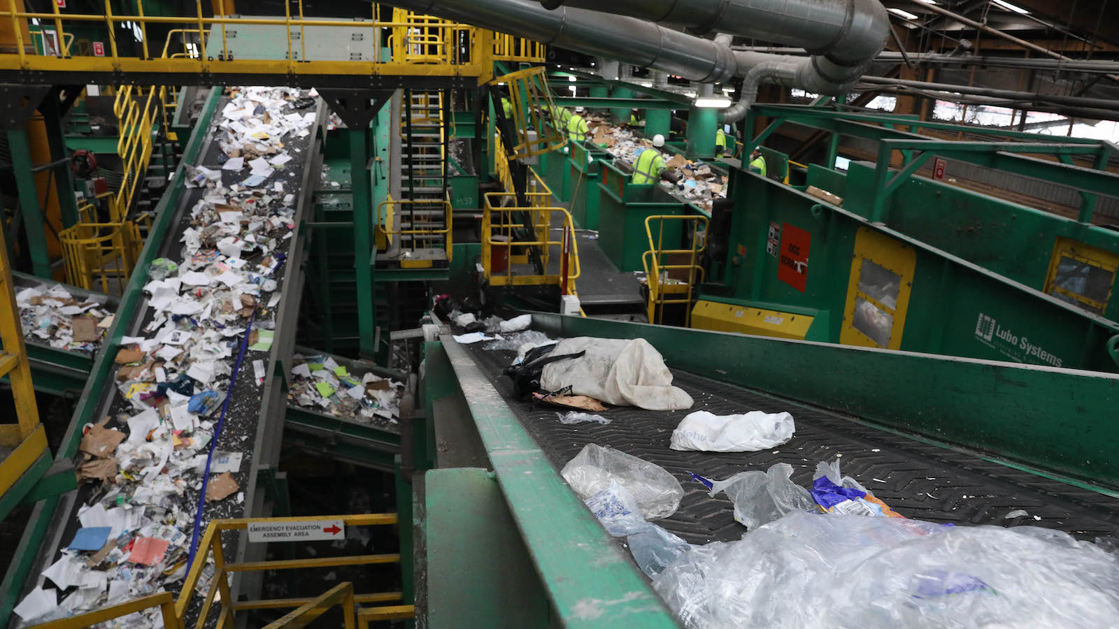 Conveyor belt with plastic on it.