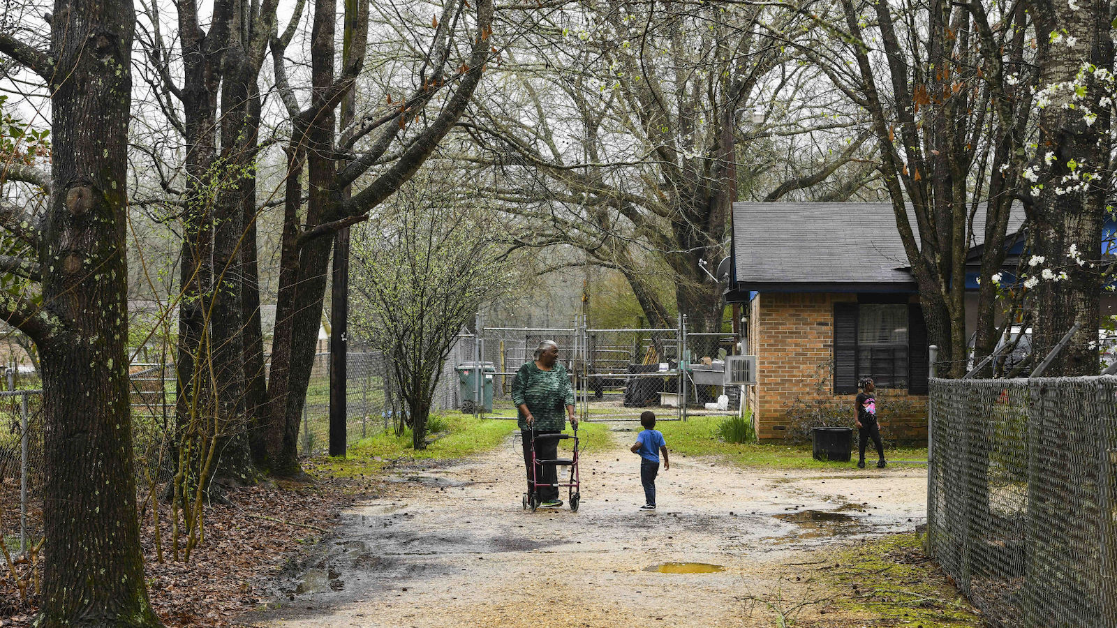 Lowndes County residents walking down a path