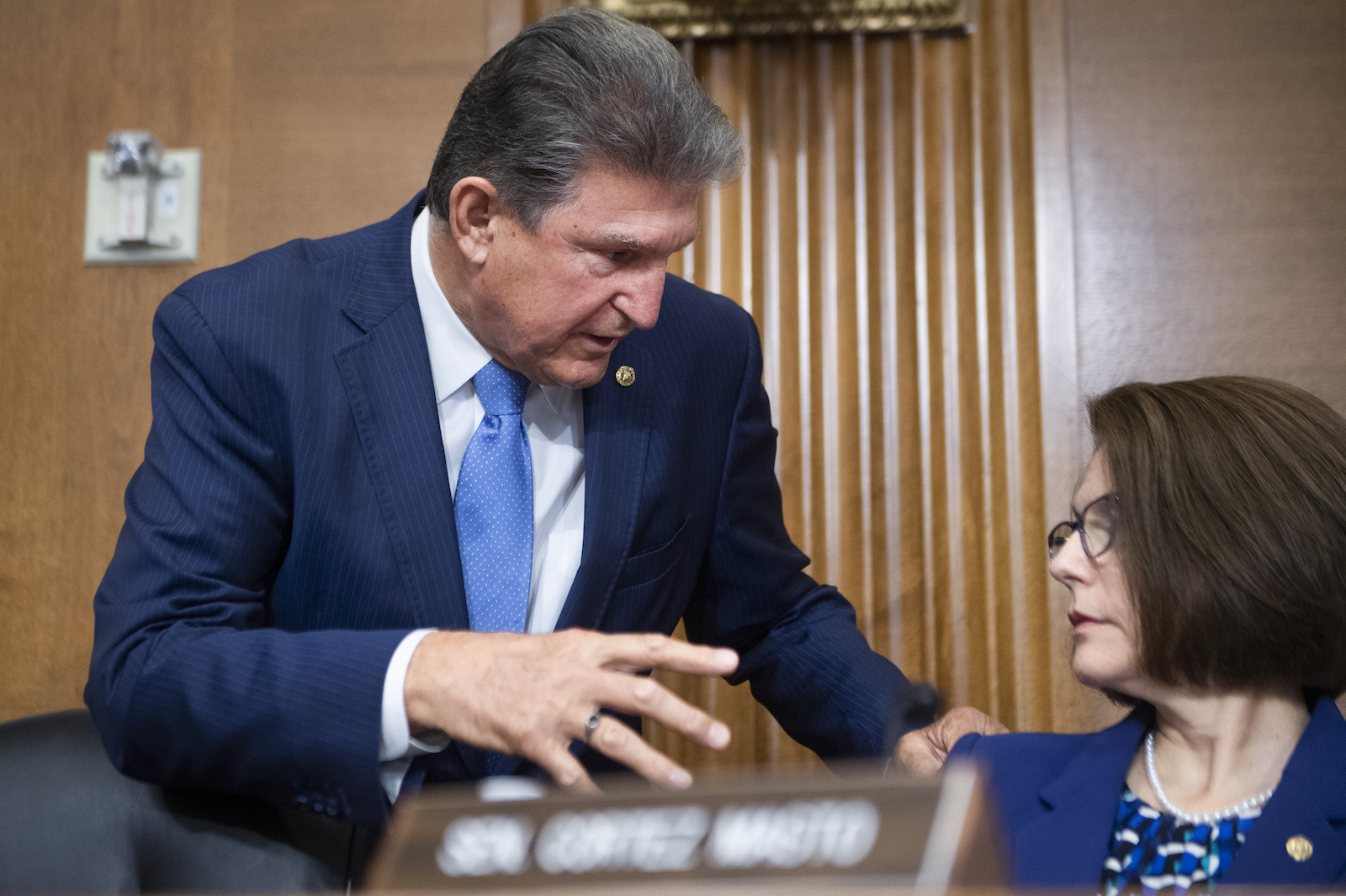 Chairman Sen. Joe Manchin, D-W.Va., and Sen. Catherine Cortez Masto, D-Nev., prepare for the Senate Energy and Natural Resources Committee hearing to examine “infrastructure needs of the U.S. energy sector, western water and public lands,” in Dirksen Building on Thursday, June 24, 2021.