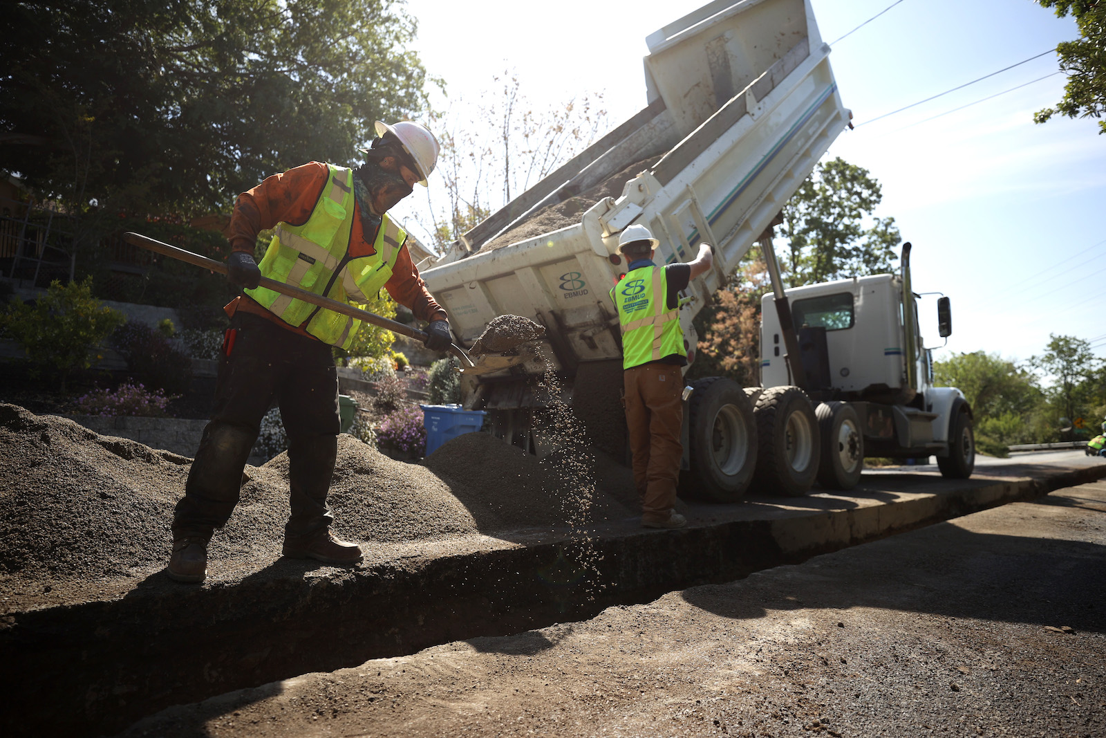 A laborer works on a water line in California. Joe Biden’s Infrastructure bill is set to make environmental justice investments commonplace.