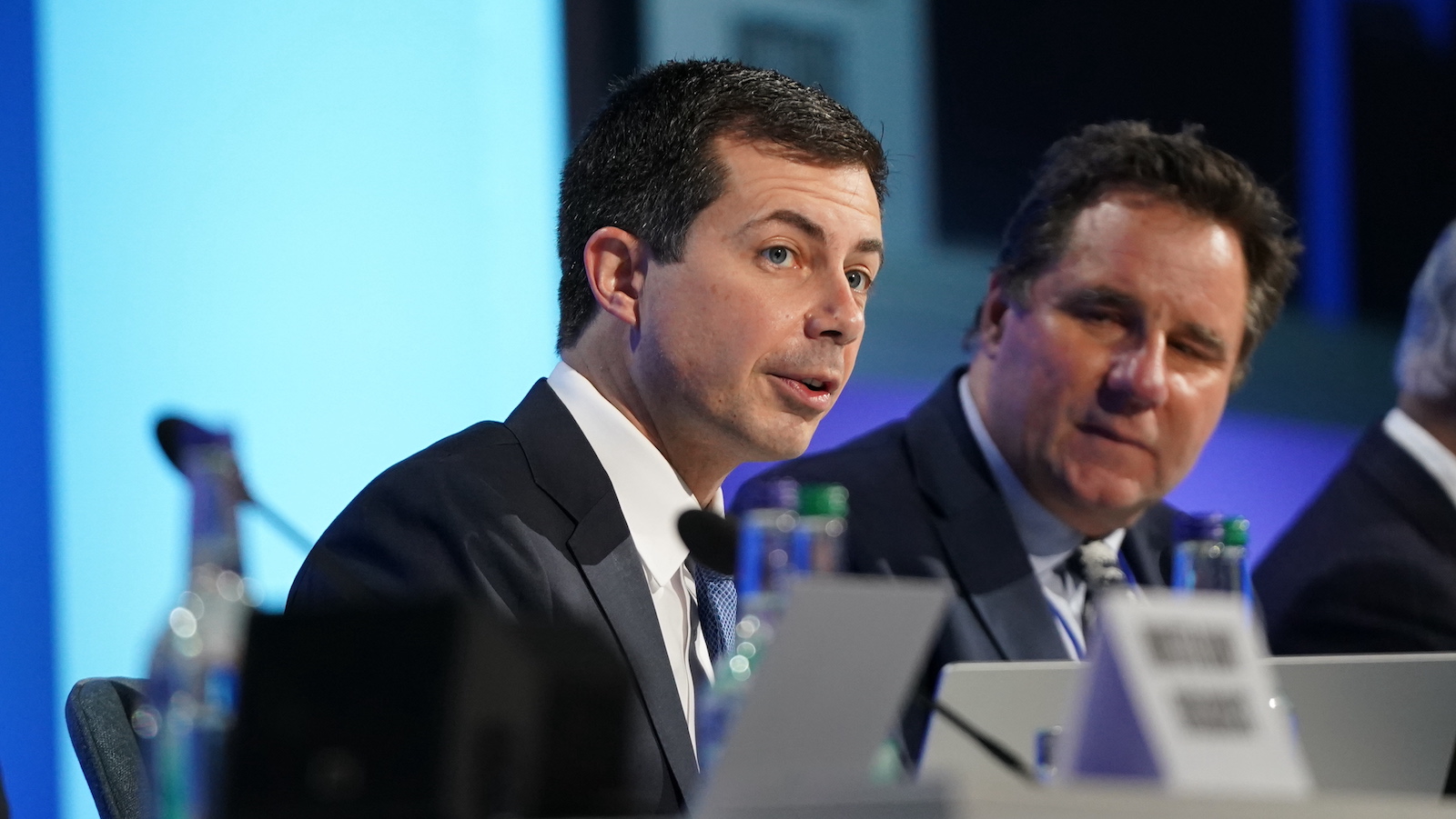 Pete Buttigieg speaks at a press conference at COP26.