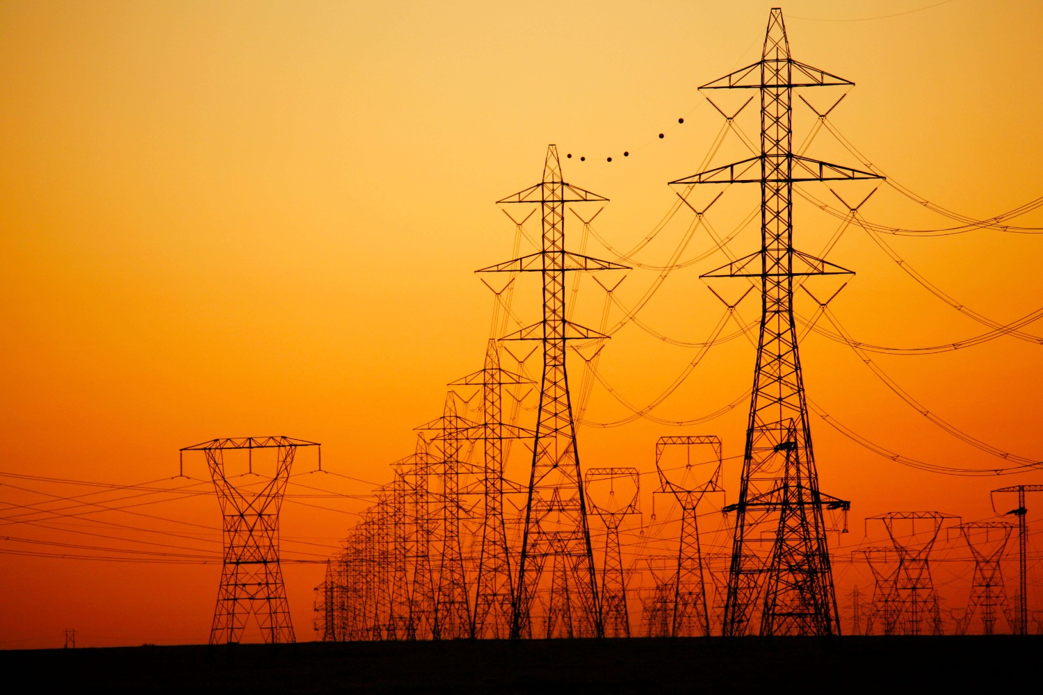 High voltage transmission lines along the Columbia River.