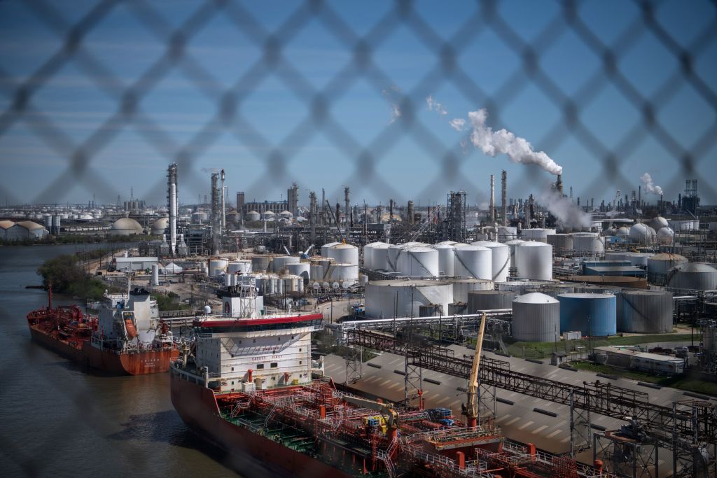 Ships are docked along refinery facilities at the Houston Ship Channel in Texas.