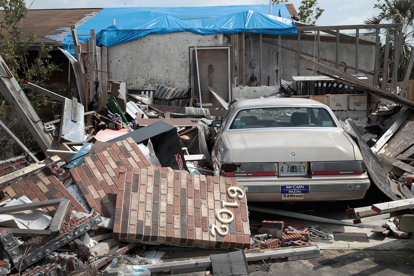 Debris still litters the front of a home that was damaged by Hurricane Michael on May 10, 2019 in Panama City, Florida.