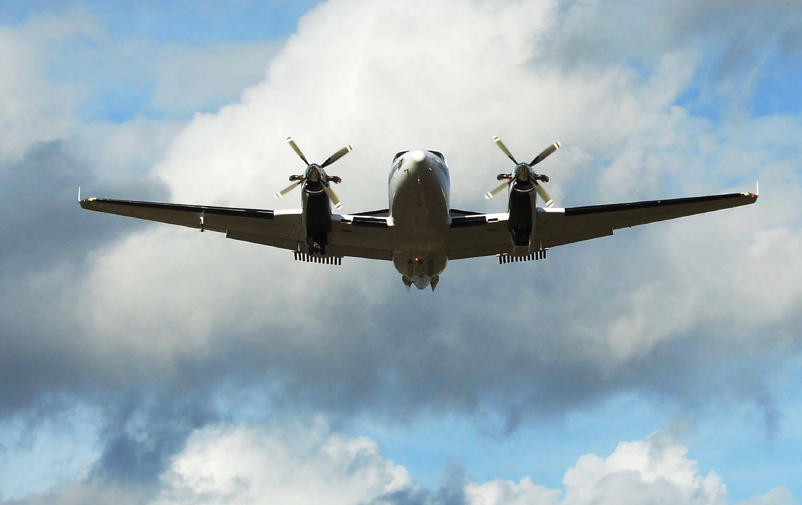 A BQ-100 Beechcraft aircraft fitted with canisters containing Silver Iodide, Sodium Chloride and Potassium Chloride on its wings takes off during the cloud seeding experiment Project Varshadhari at Jakkur Airport in the Indian city of Bangalore on August 21, 2017.