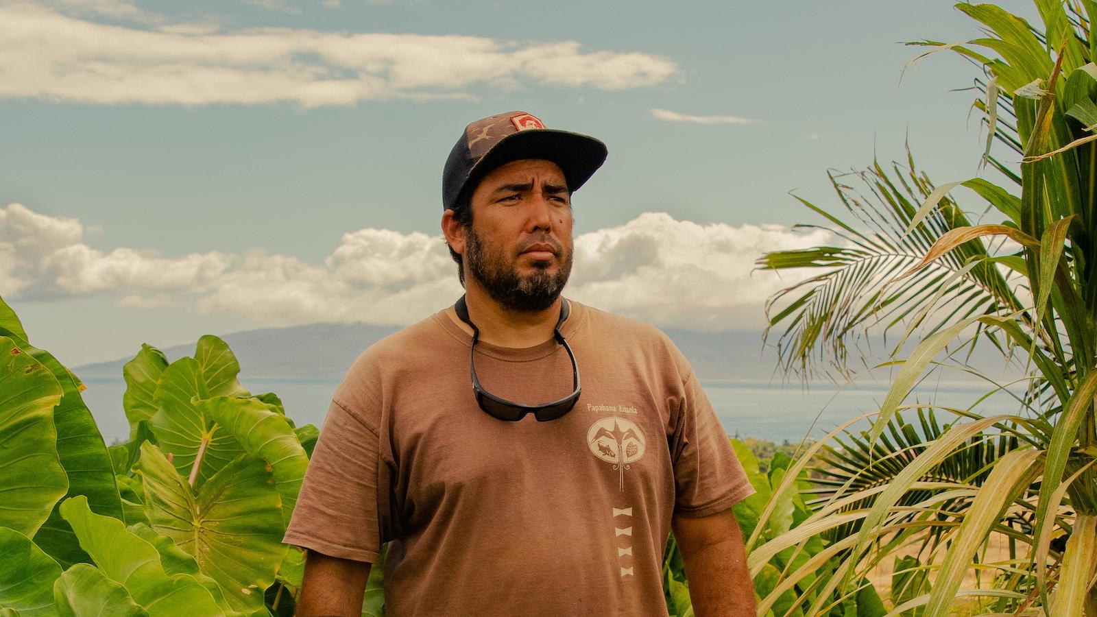 A front facing portrait of Kaipo Kekona, an Indigenous Hawaiian farmer.