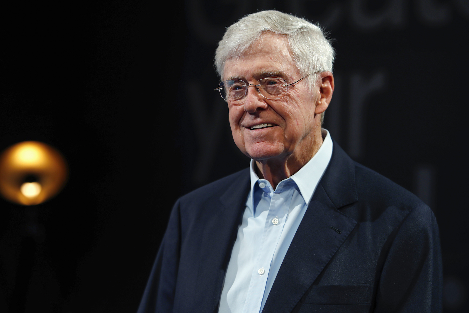 man wearing collared shirt and blazer