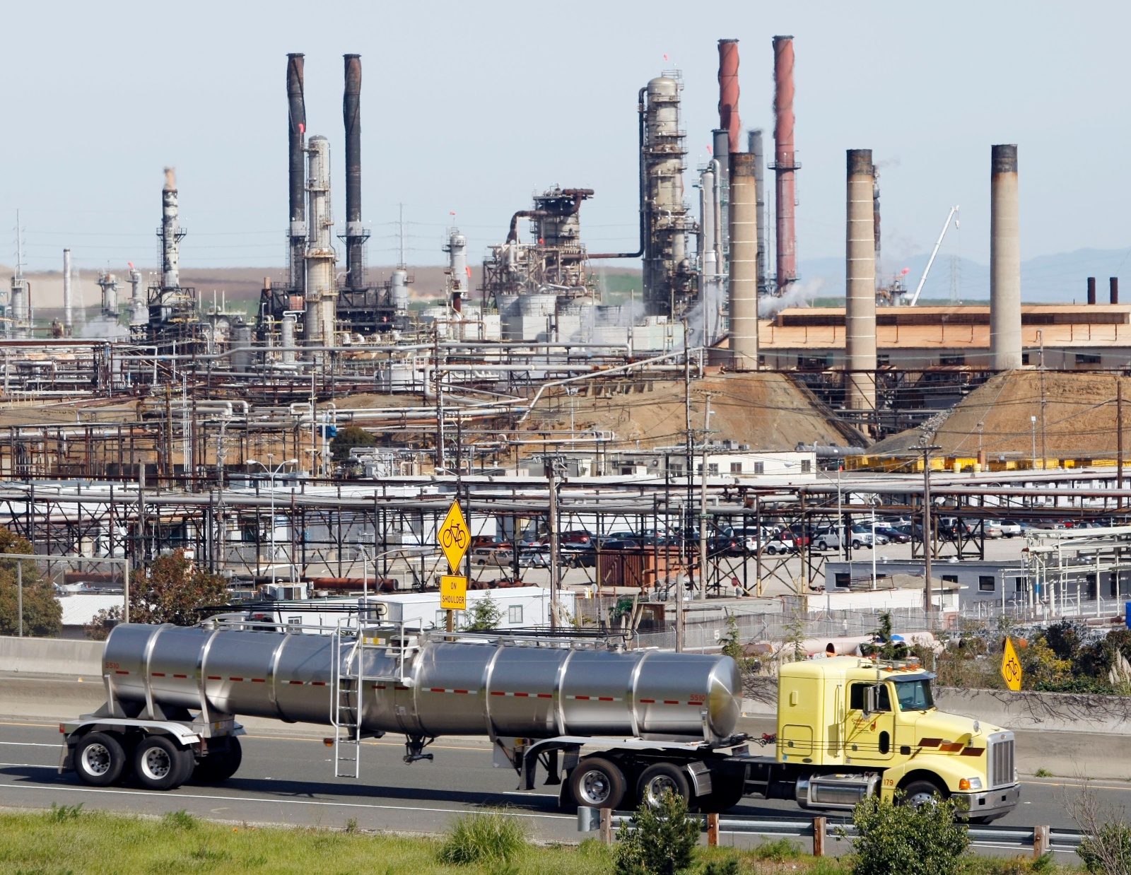 A large refinery with lots of smokestacks