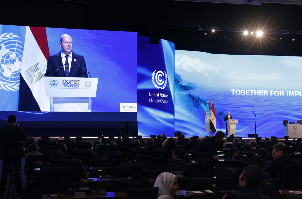 German Chancellor Olaf Scholz speaks on stage at COP27.