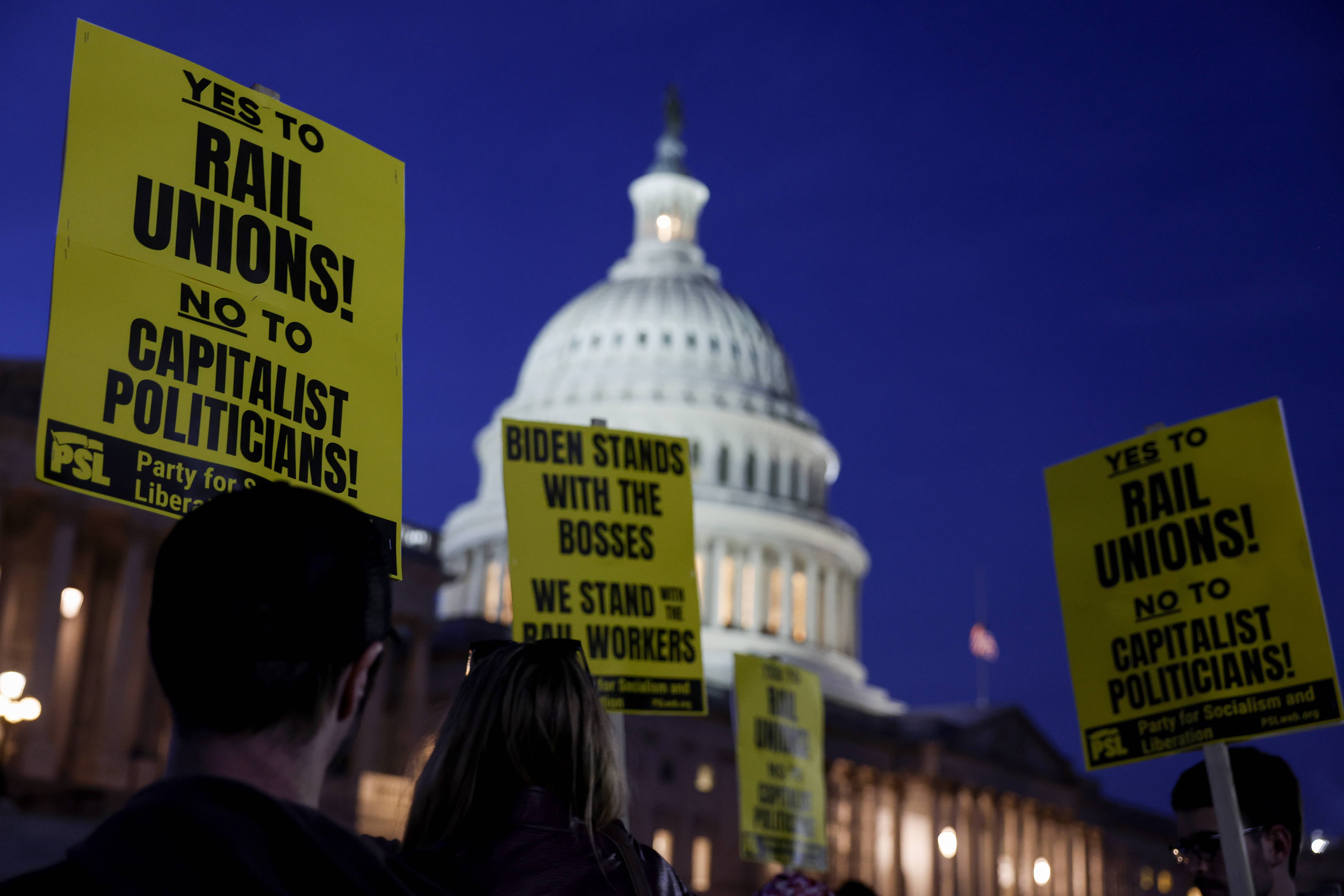 photos of pro-rail union signs held up with the capitol in the background