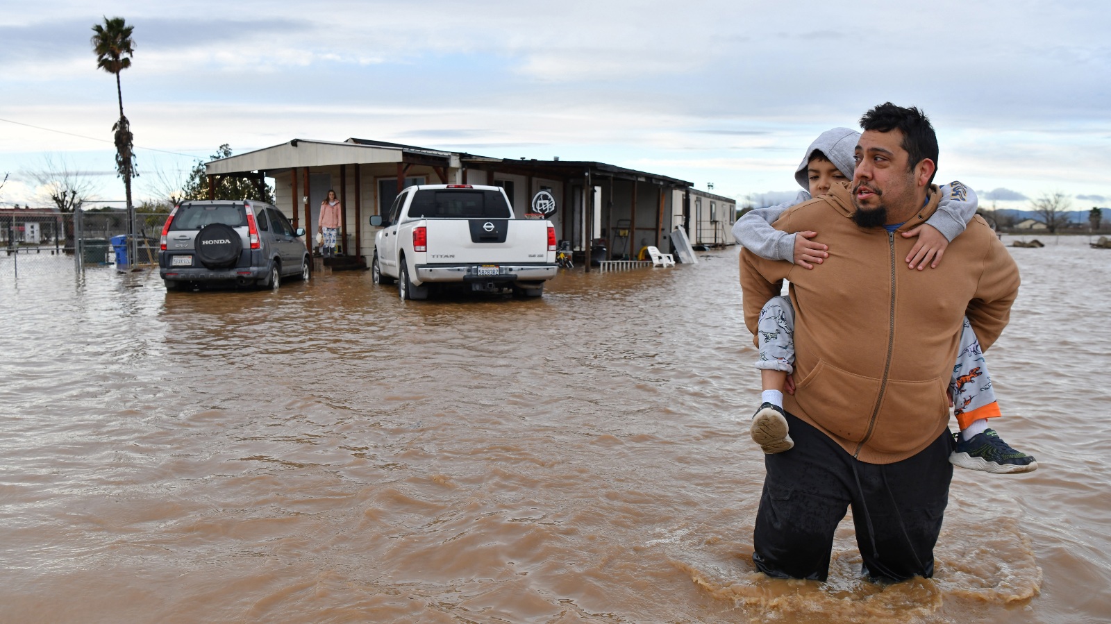 Father son carried flooding Brentwood California