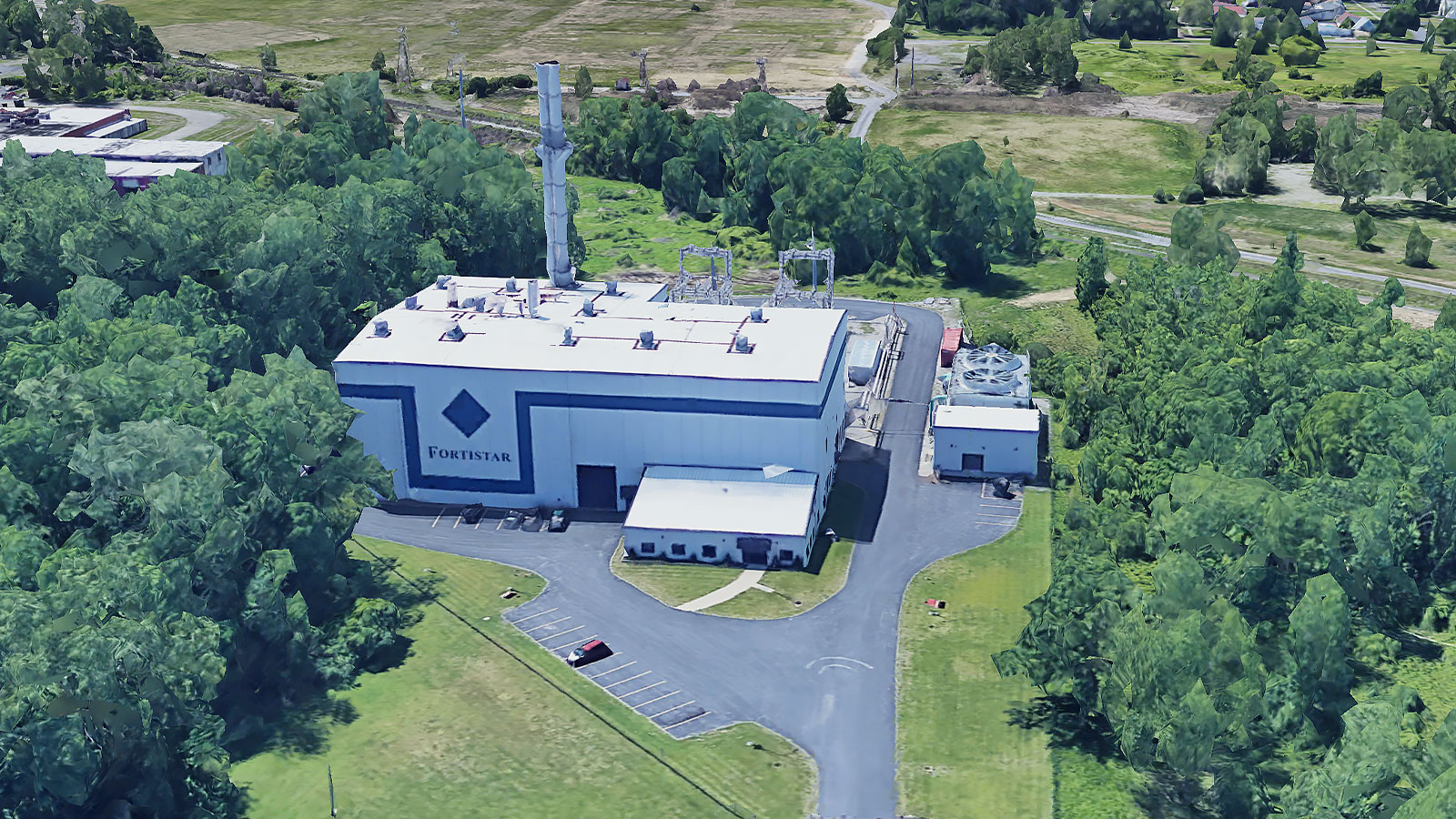 Satellite image of Fortistar power plant surrounded by trees