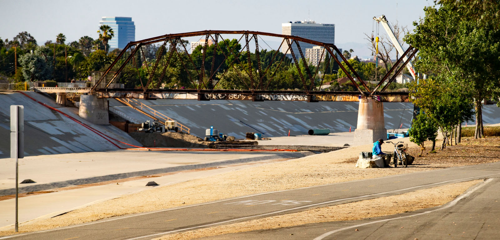 A truss bridge where trains used to cross over the Santa Ana River channel