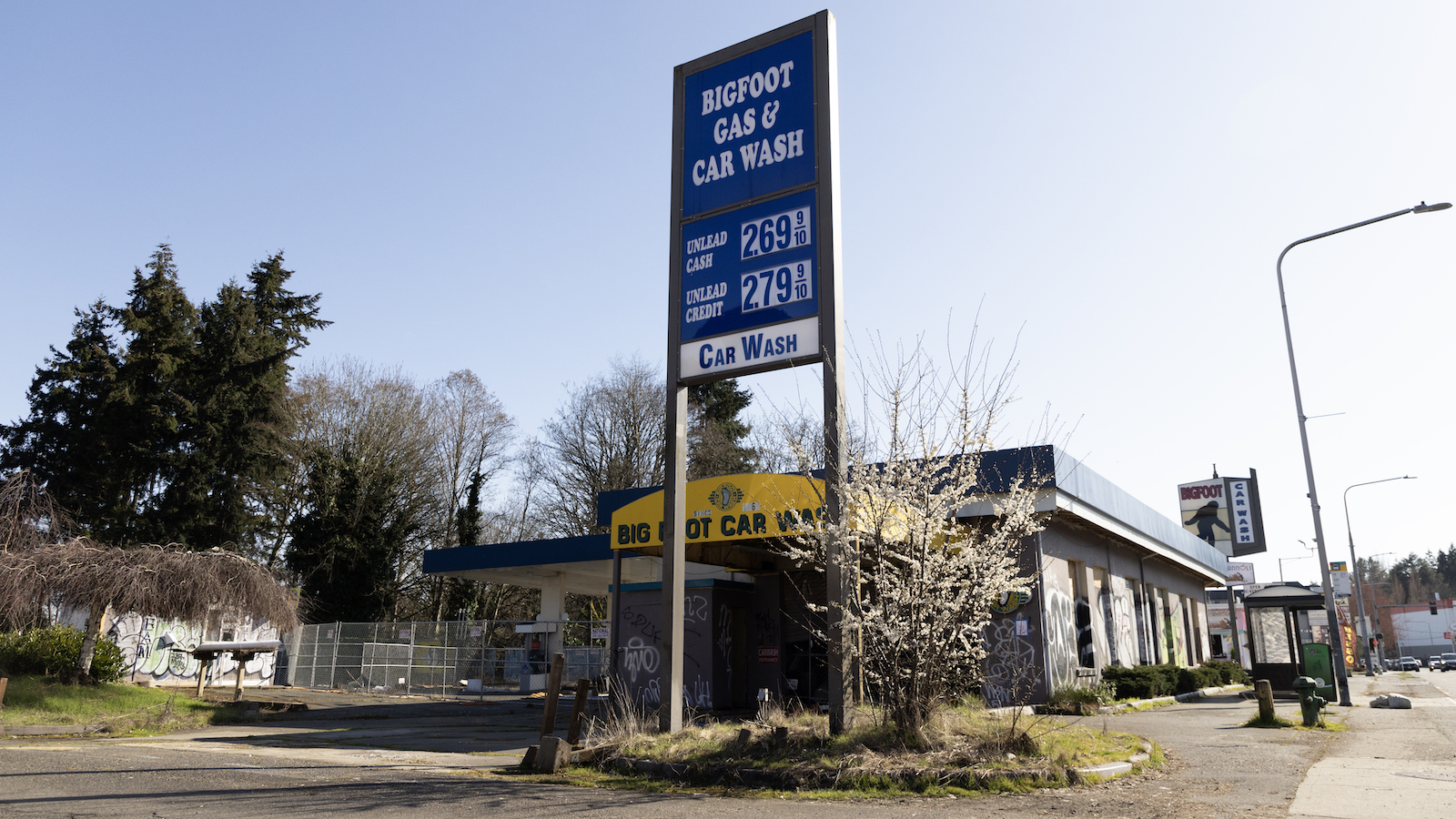 a sign outside of a gas station