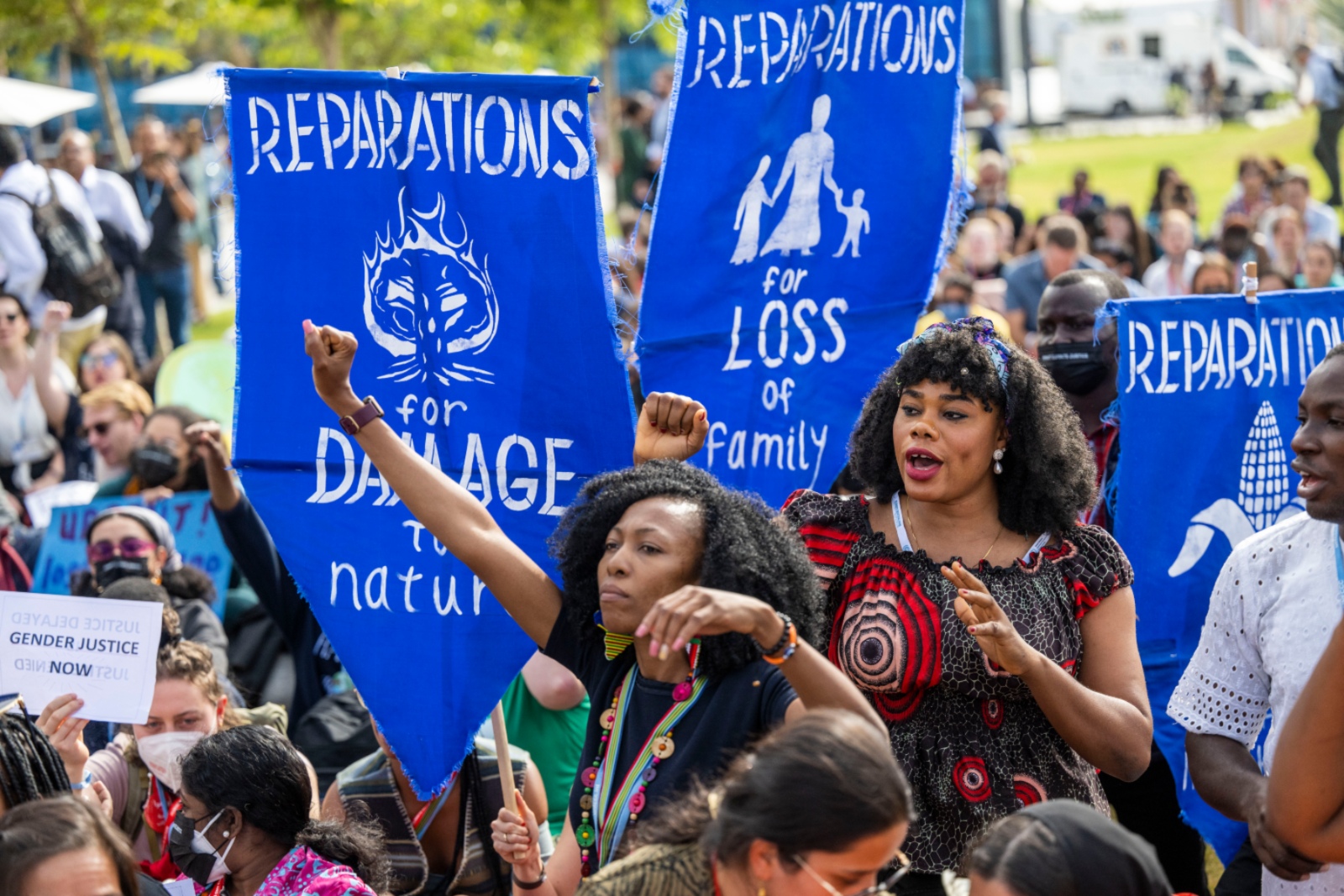 A group of people protest at COP27, the climate change conference held in Egypt in 2022