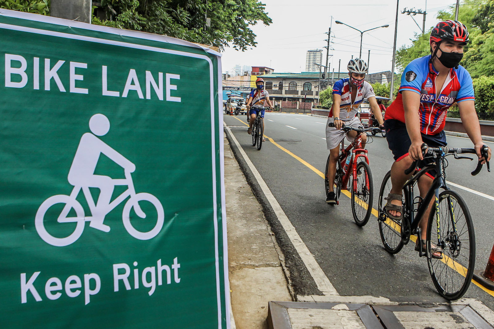 people on bikes in a bike lan