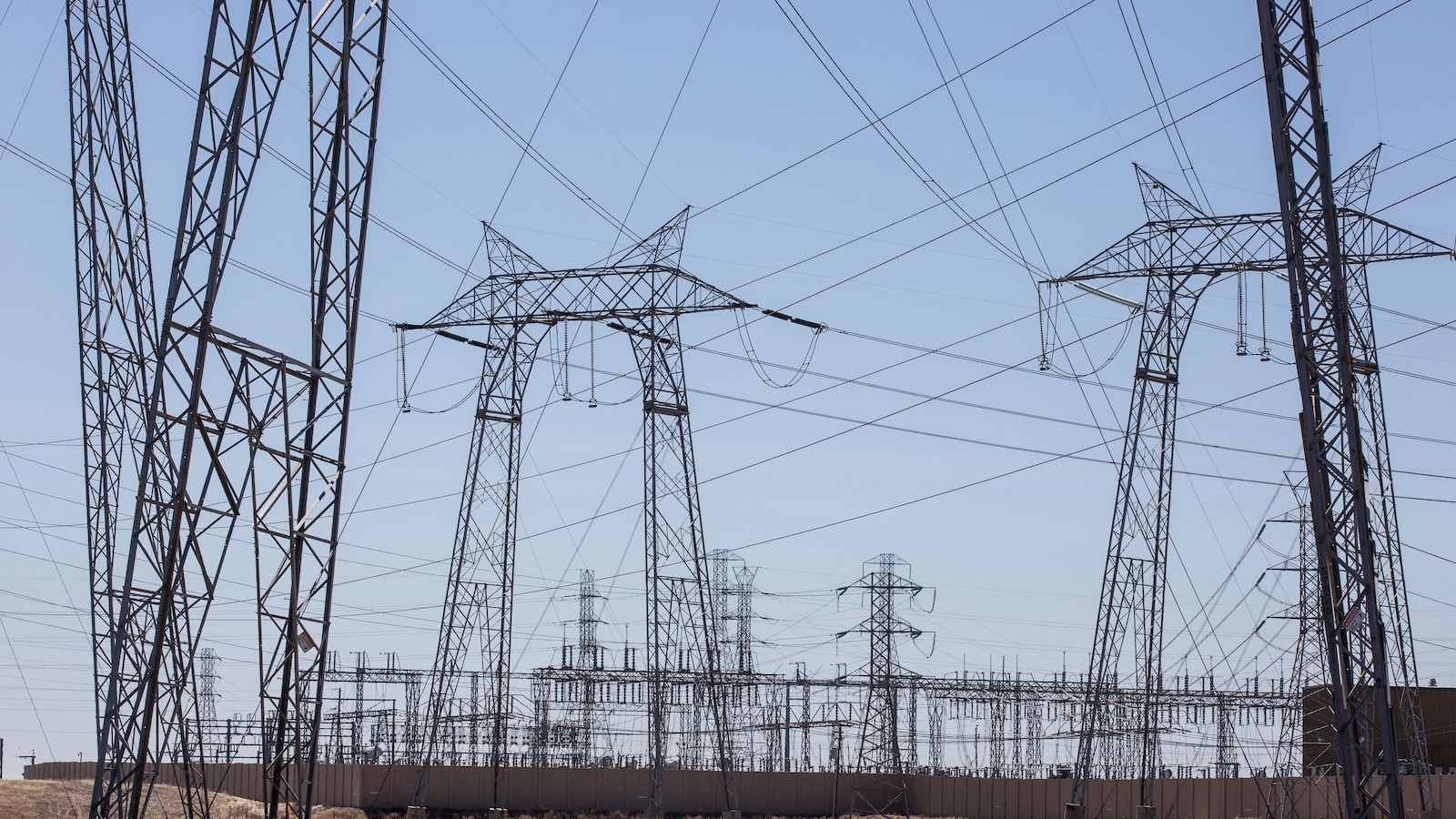 Transmission lines with blue sky