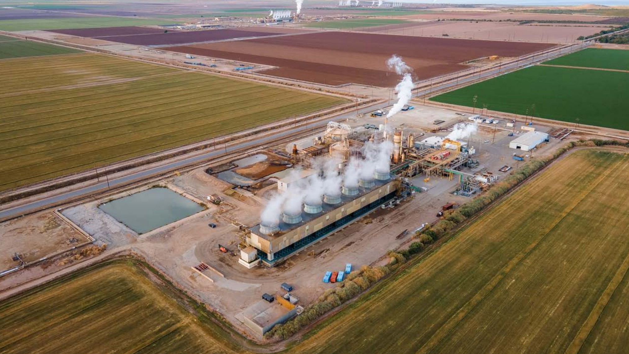 An overhead image of an industrial facility next to agricultural fields.