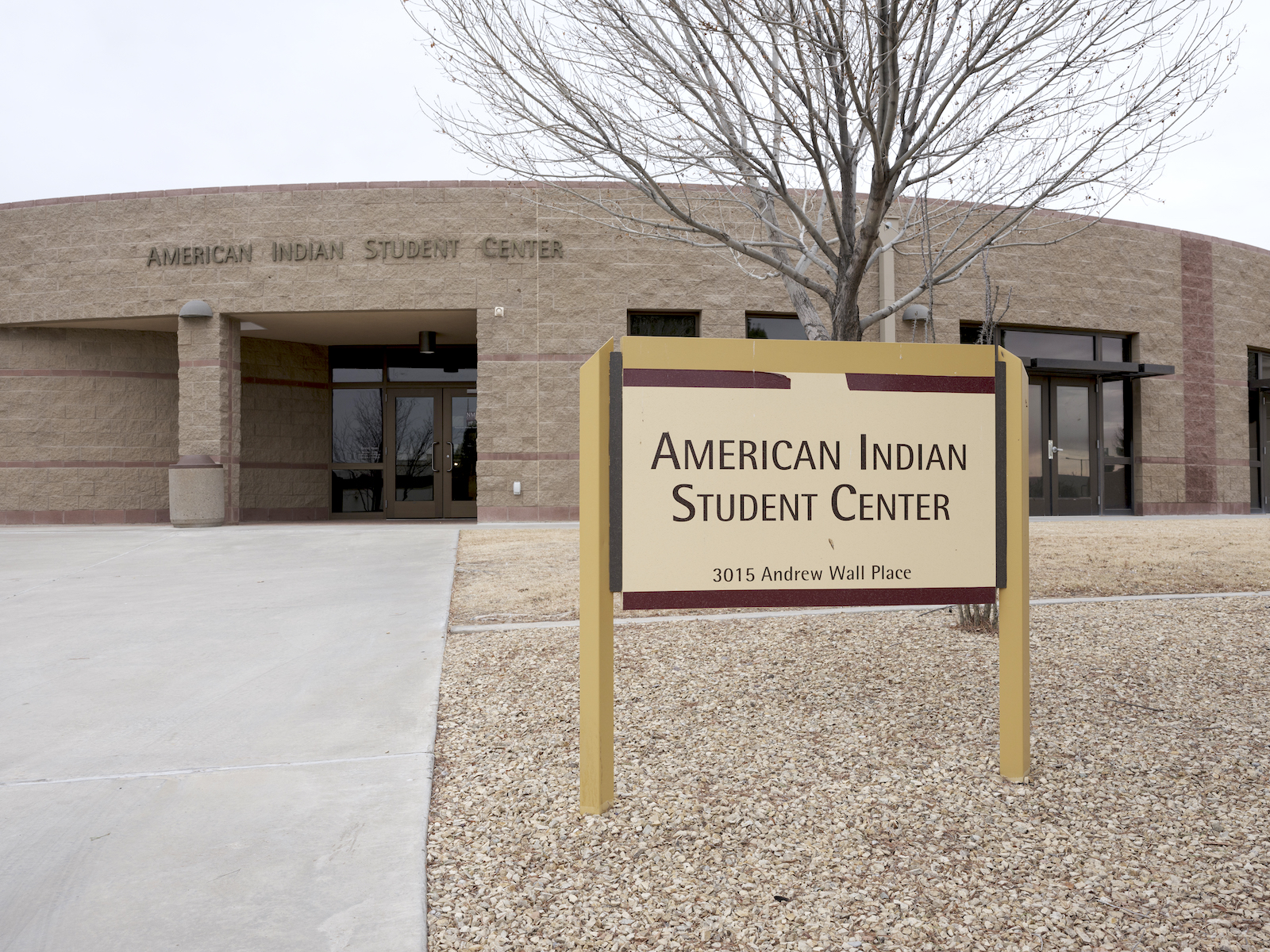 sign that says American Indian Student Center in front of a building