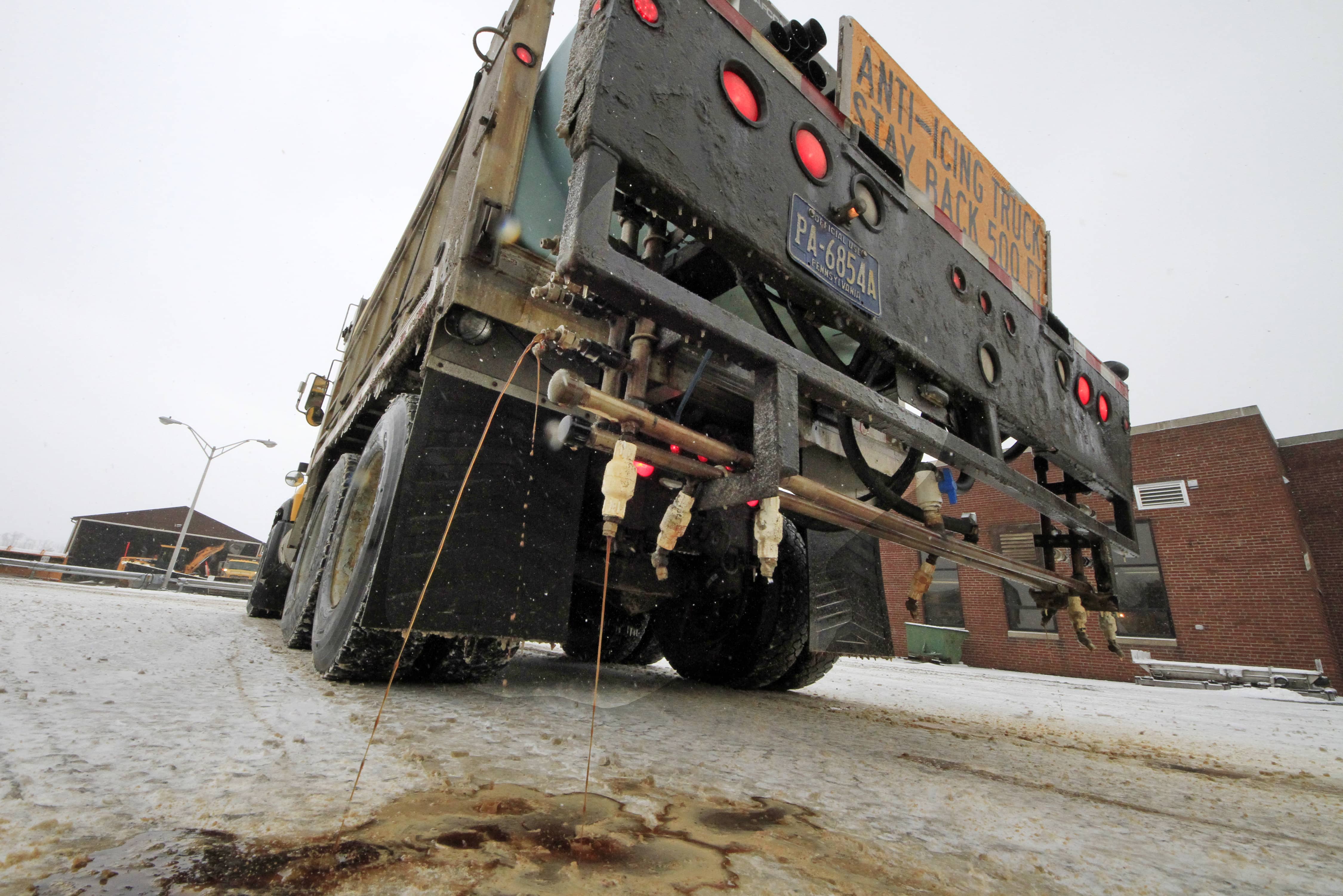 Truck spreading brine on Pennsylvania road